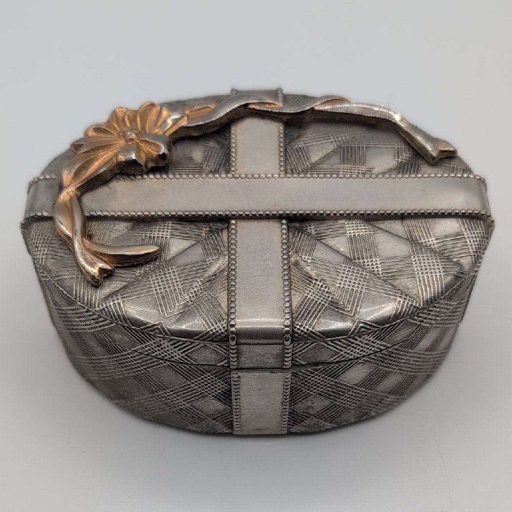 Elegant Silver Plated Zinc Trinket Jewelry Box With Gold Toned Ribbon Accent.